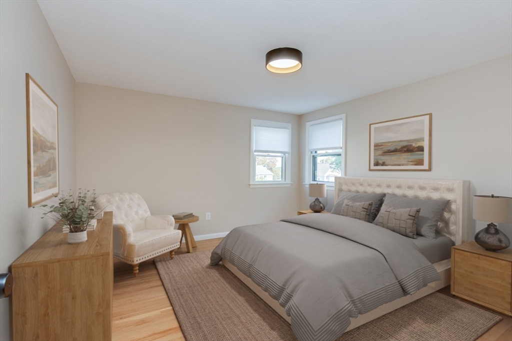 2 Oceanview Avenue Saugus, MA 01906 - Photo 18 of 41 a bedroom with a bed and a couch