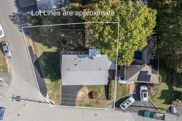 an aerial view of a house with swimming pool