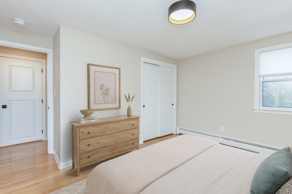 2 Oceanview Avenue Saugus, MA 01906 - Photo 25 of 41 a bedroom with a bed and a dresser