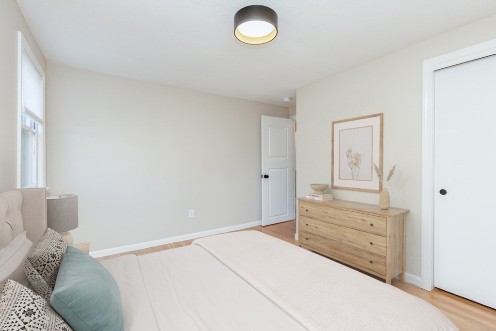 2 Oceanview Avenue Saugus, MA 01906 - Photo 26 of 41 a bedroom with a bed and a couch