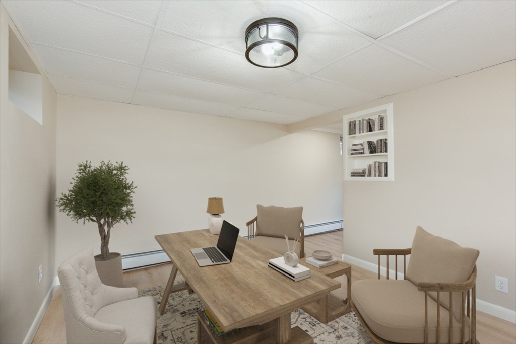 2 Oceanview Avenue Saugus, MA 01906 - Photo 31 of 41 a view of a dining room with furniture and chandelier