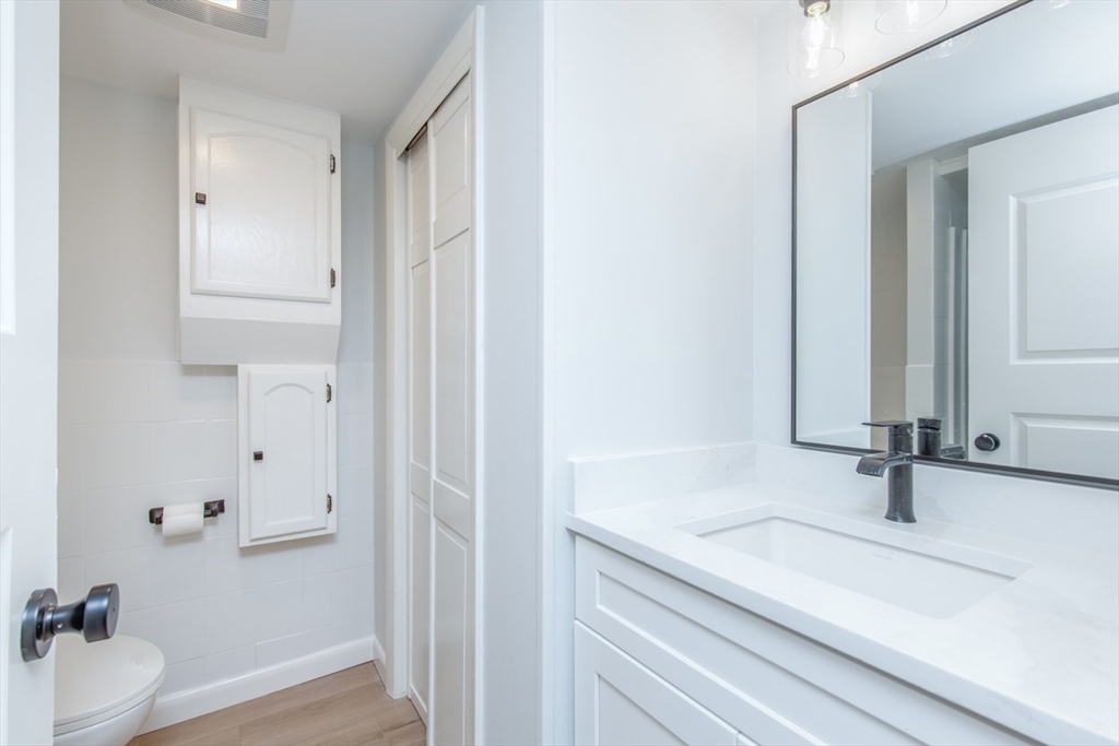 2 Oceanview Avenue Saugus, MA 01906 - Photo 34 of 41 a bathroom with a sink and a mirror