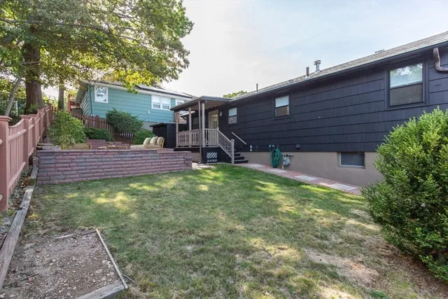 a view of a yard with a patio