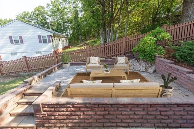 a view of balcony with wooden floor