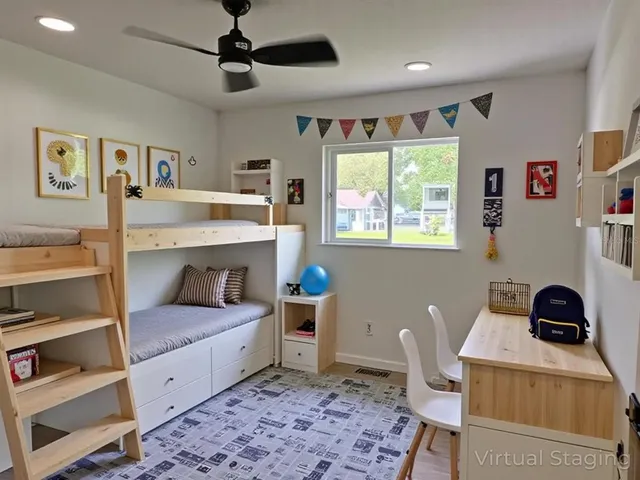 a bedroom with furniture and a window