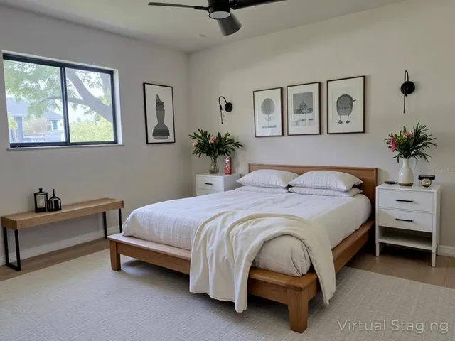a spacious bedroom with a bed and a couch