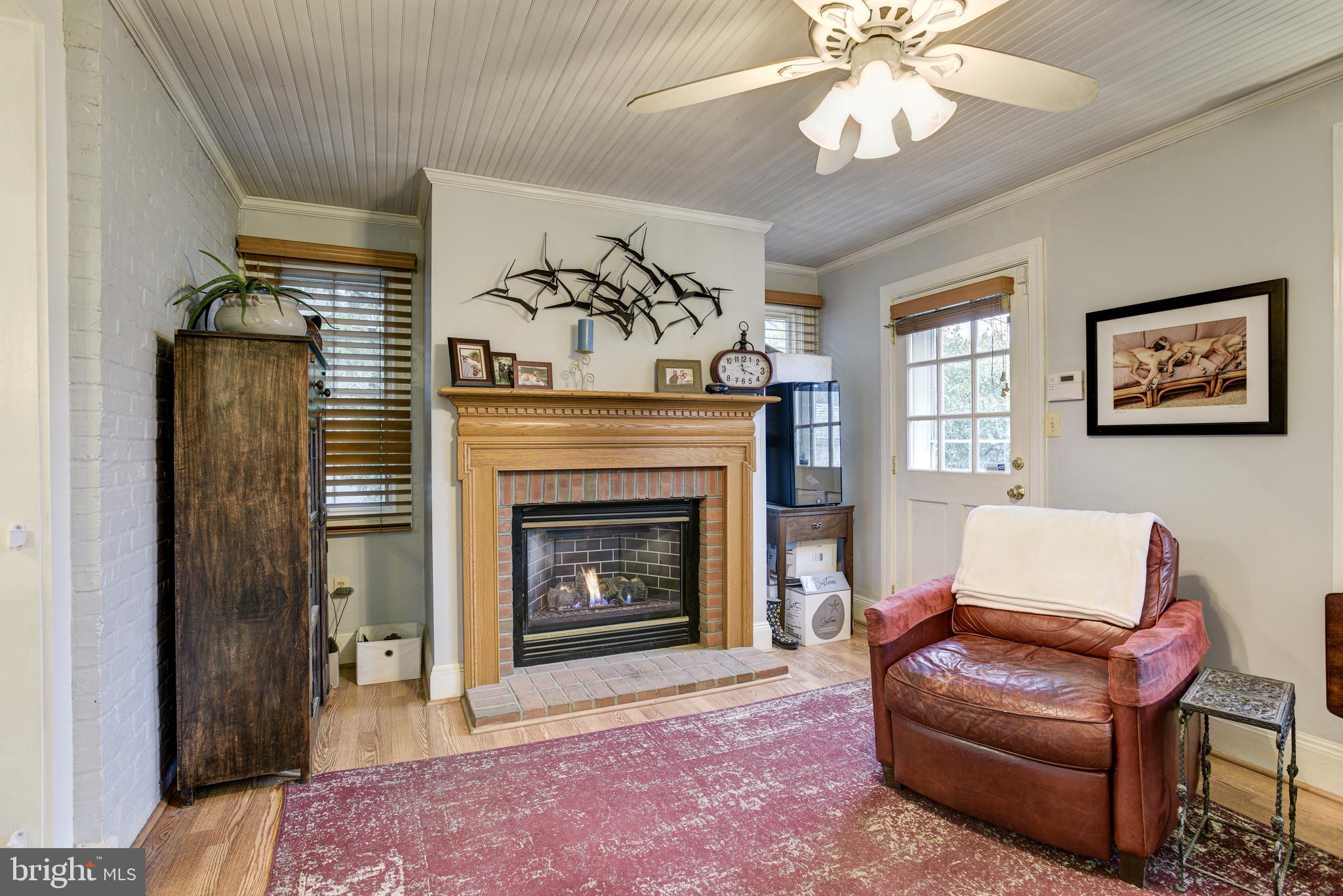 312 St Dunstans Road Baltimore, MD 21212 - Photo 5 of 54 Gas fireplace in family room addition.
