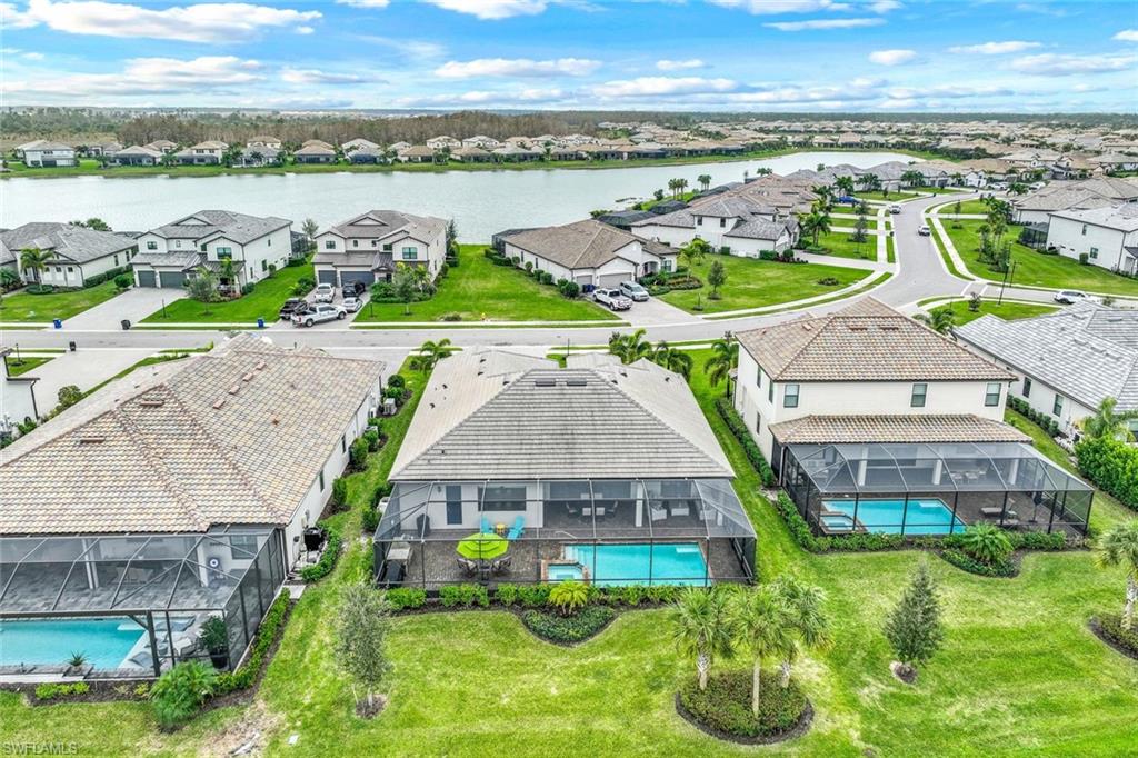 19437 The Pl Boulevard Estero, FL 33928 - Photo 30 of 37 an aerial view of multiple house