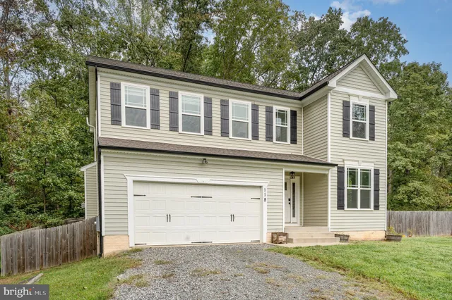 front view of house with a yard
