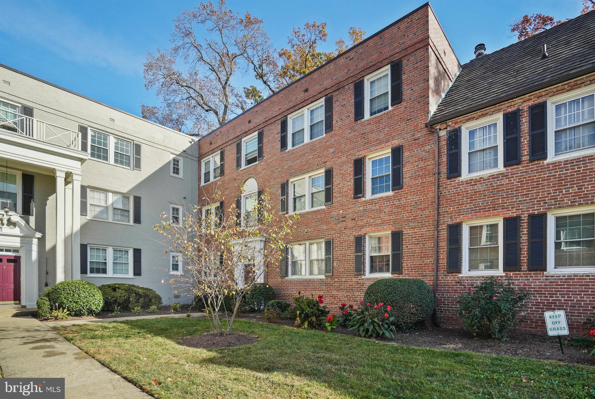 3814 V Street Southeast, Unit 201 Washington, DC 20020 - Photo 5 of 5 a front view of a house with garden