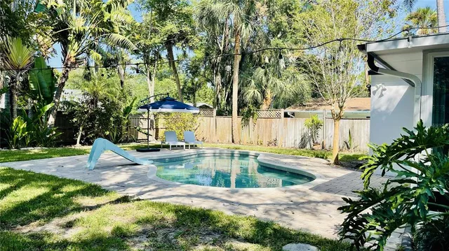 a front view of a house having yard