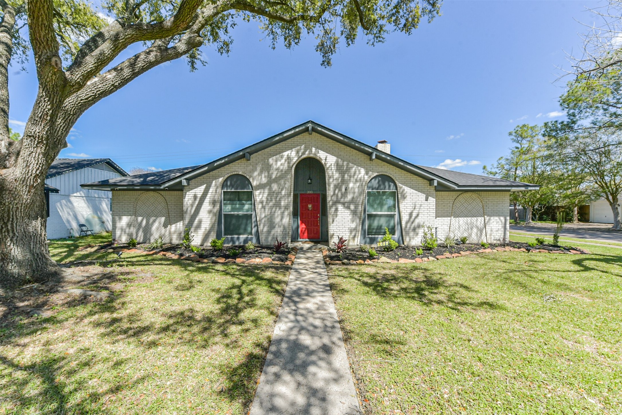 2011 North Palm Court Pasadena, TX 77502 - Photo 1 of 39 a view of a house with a yard