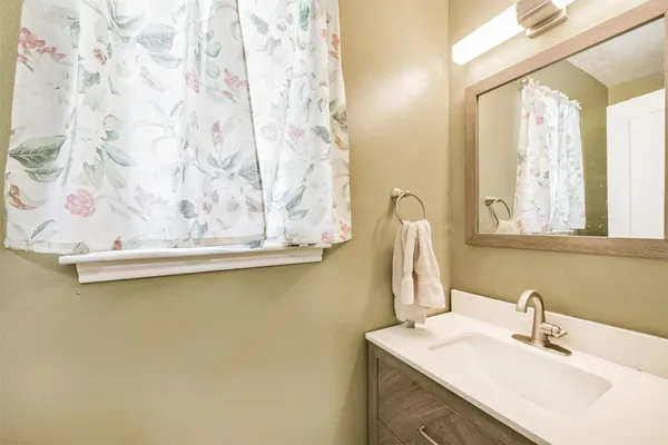 a bedroom with a bed and a walk in closet