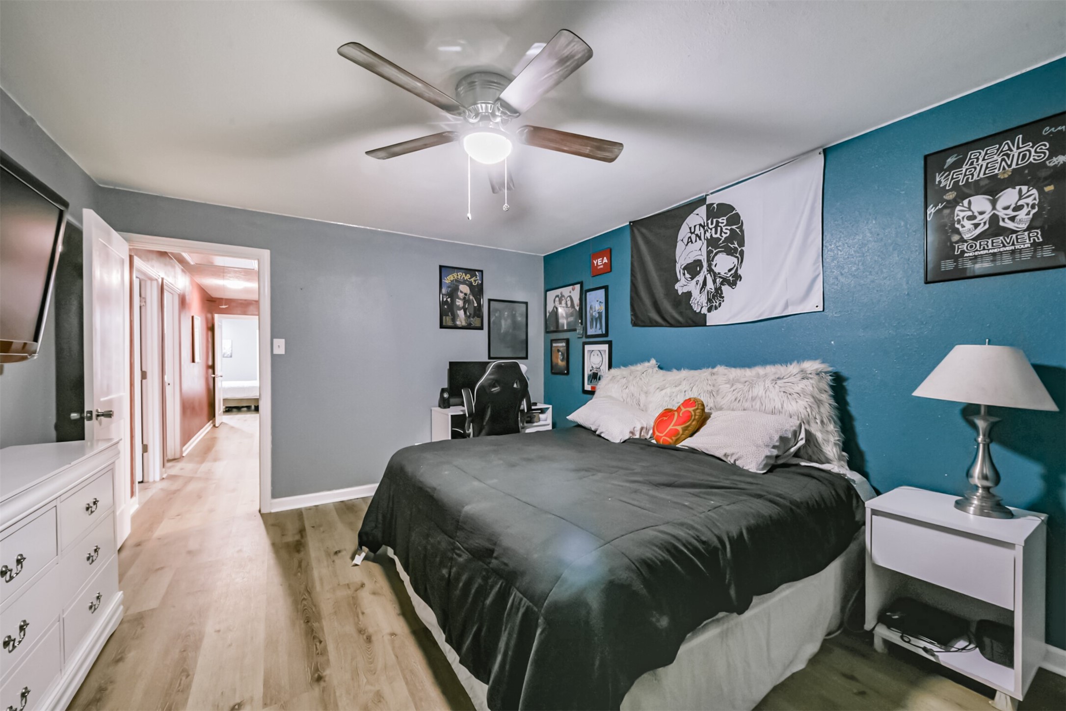 2011 North Palm Court Pasadena, TX 77502 - Photo 20 of 39 a bedroom with bed and a large mirror