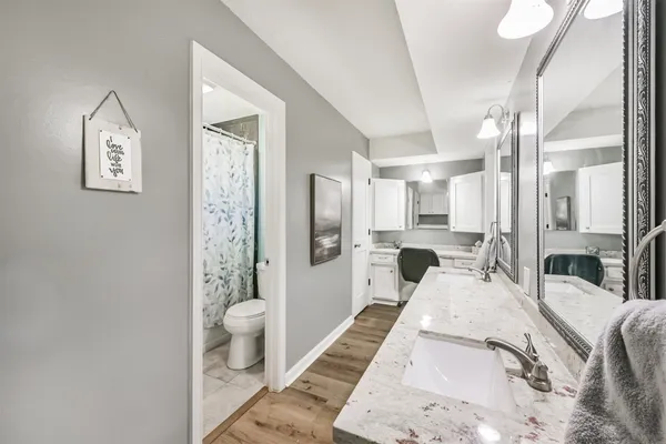 a bathroom with a sink and a mirror
