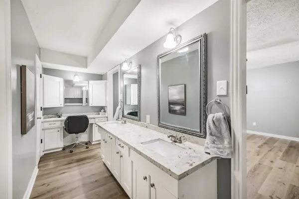 a bathroom with a toilet and a tub