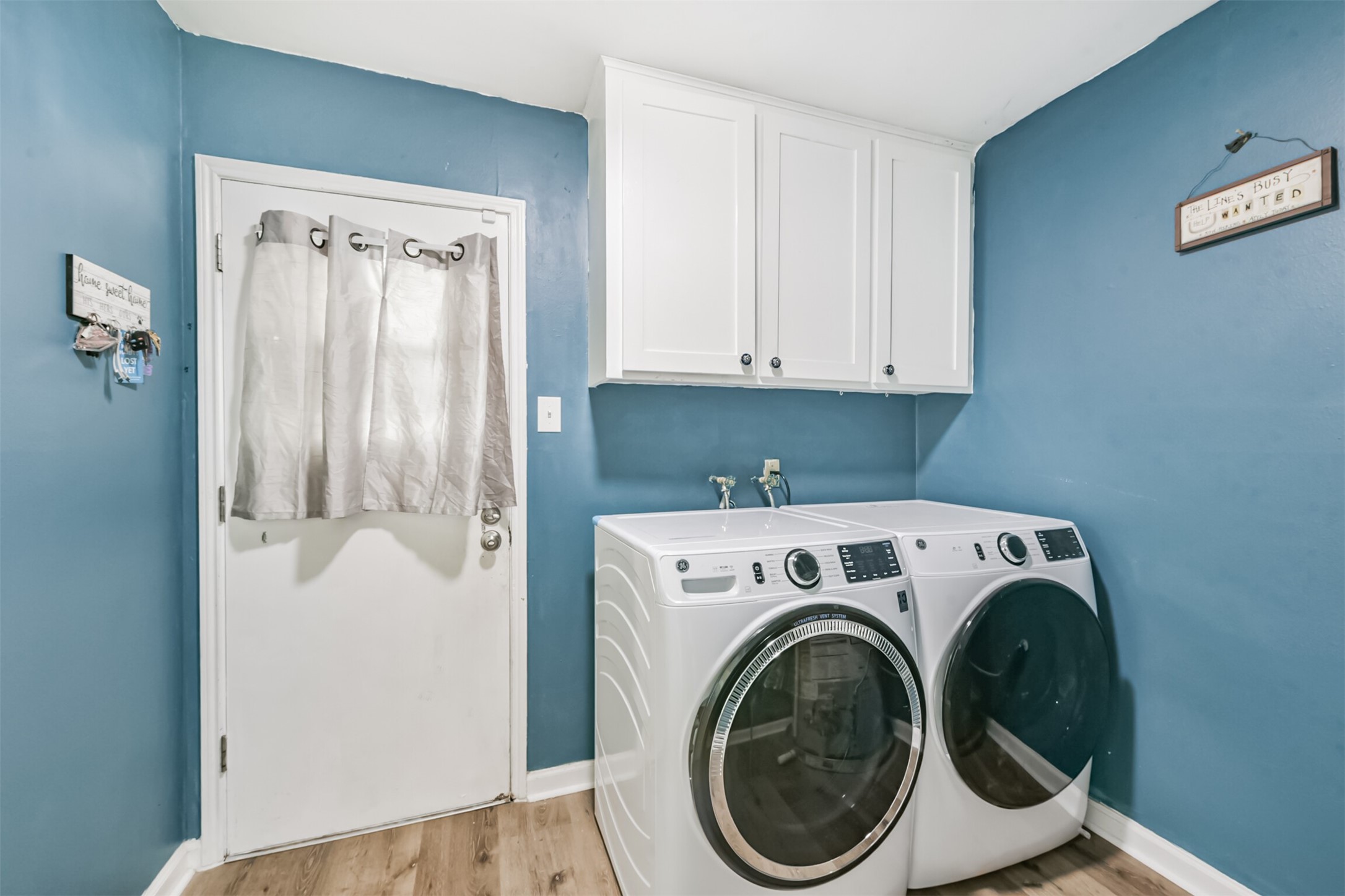 2011 North Palm Court Pasadena, TX 77502 - Photo 35 of 39 a utility room with dryer and washer