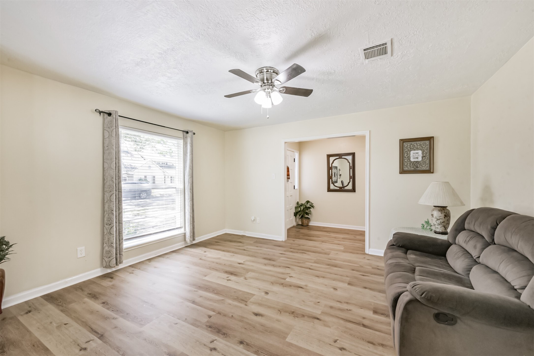 2011 North Palm Court Pasadena, TX 77502 - Photo 5 of 39 a view of livingroom with furniture and wooden floor