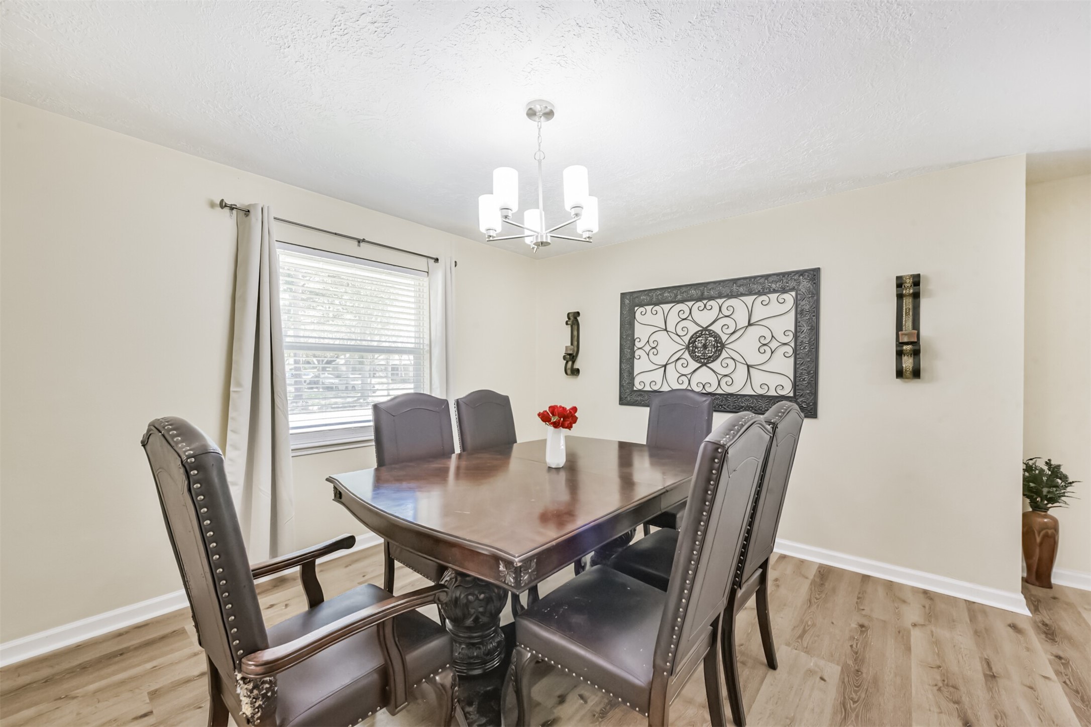 2011 North Palm Court Pasadena, TX 77502 - Photo 6 of 39 a view of a dining room with furniture window and wooden floor