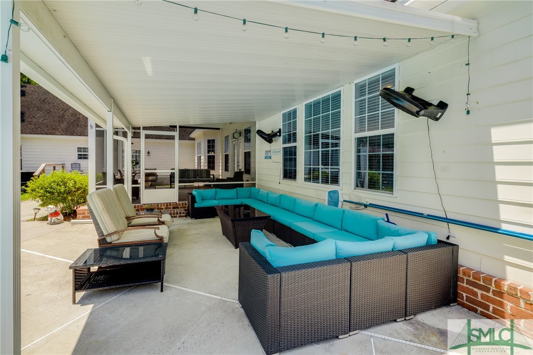 278 Harley Road Guyton, GA 31312 - Photo 33 of 50 Covered outdoor lounging area
