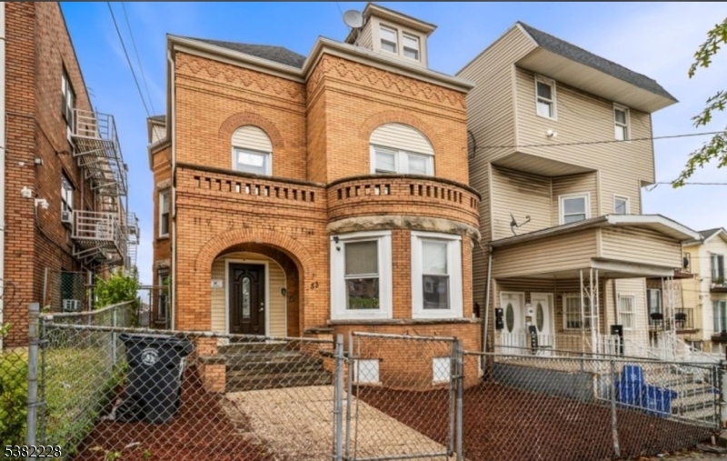 a front view of a house with a balcony