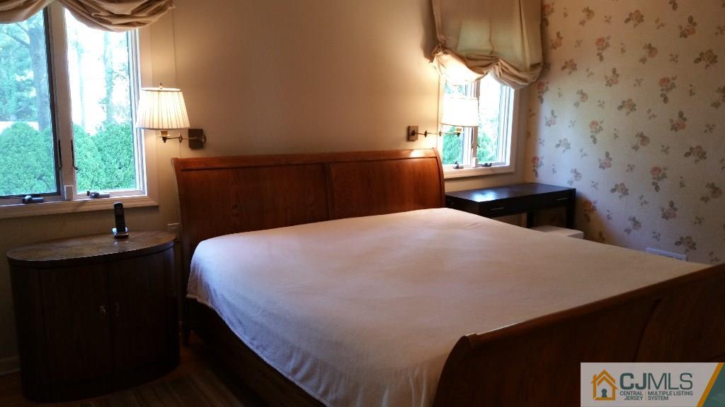 32 Peru Street Edison, NJ 08820 - Photo 17 of 25 a bedroom with a bed and a window