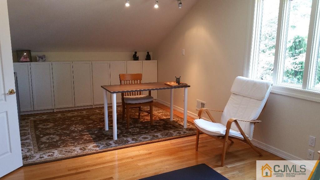 32 Peru Street Edison, NJ 08820 - Photo 22 of 25 a view of a workspace with furniture and a window
