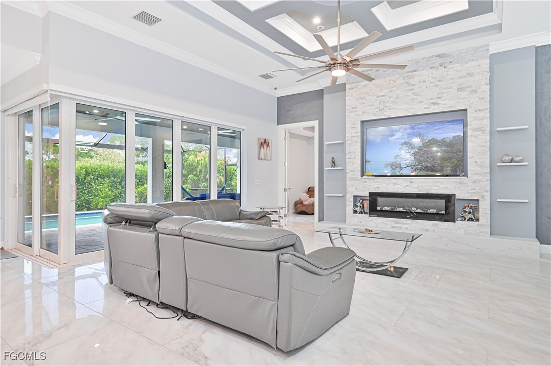 2273 Crystal Drive Fort Myers, FL 33907 - Photo 13 of 46 a living room with furniture and a large window
