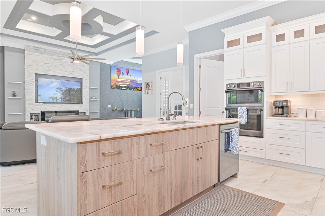 2273 Crystal Drive Fort Myers, FL 33907 - Photo 19 of 46 a bathroom with a sink a vanity and a large mirror