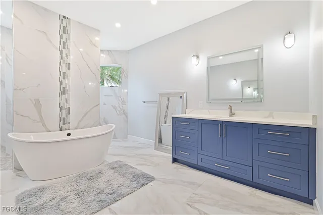 a bedroom with a bed and a cabinets