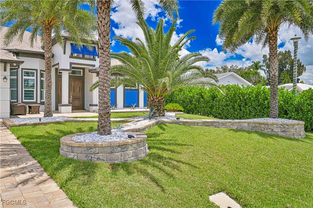 2273 Crystal Drive Fort Myers, FL 33907 - Photo 3 of 46 a view of a house with a swimming pool