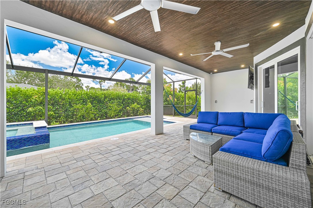 2273 Crystal Drive Fort Myers, FL 33907 - Photo 7 of 46 a living room with furniture and a large window