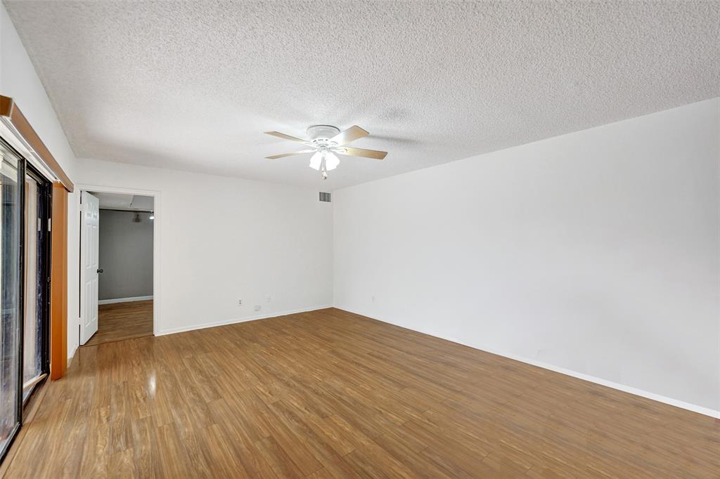 11884 Southwest 12th Place, Unit 11884 Davie, FL 33325 - Photo 20 of 48 wooden floor in an empty room with a window