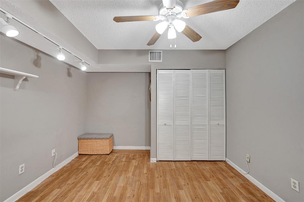 11884 Southwest 12th Place, Unit 11884 Davie, FL 33325 - Photo 23 of 48 a view of an empty room with a window