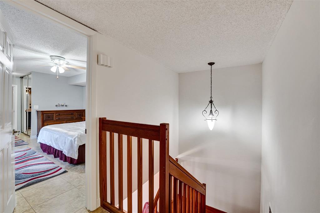 11884 Southwest 12th Place, Unit 11884 Davie, FL 33325 - Photo 24 of 48 a en suite bathroom with a double vanity sink and a mirror