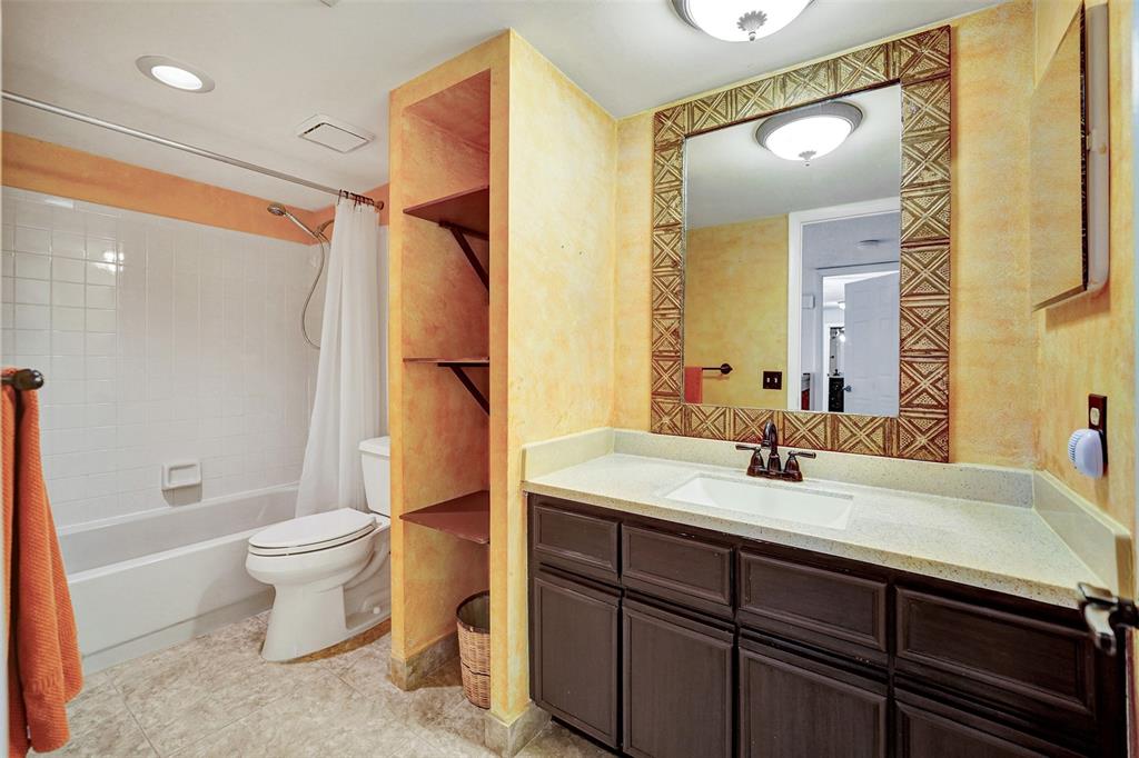 11884 Southwest 12th Place, Unit 11884 Davie, FL 33325 - Photo 25 of 48 a bathroom with a sink a toilet and shower