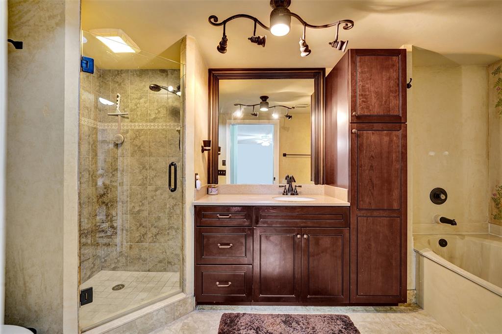 11884 Southwest 12th Place, Unit 11884 Davie, FL 33325 - Photo 35 of 48 a bathroom with a bathtub and a shower