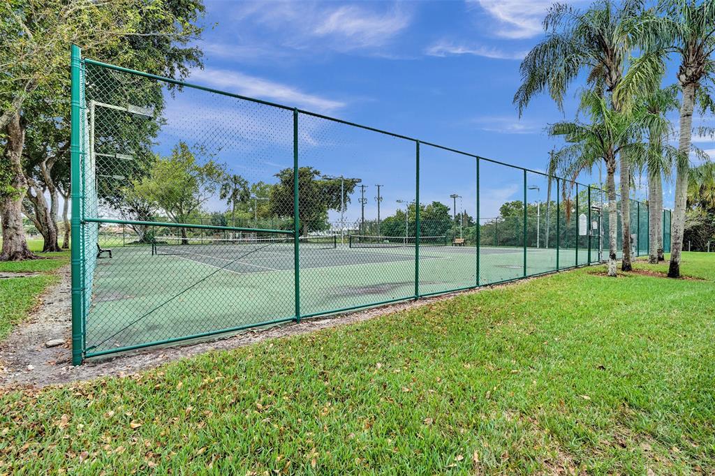 11884 Southwest 12th Place, Unit 11884 Davie, FL 33325 - Photo 45 of 48 a view of a park
