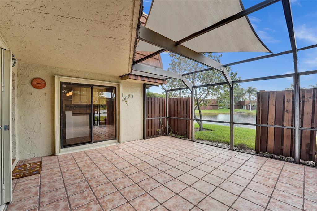 11884 Southwest 12th Place, Unit 11884 Davie, FL 33325 - Photo 9 of 48 a view of a backyard