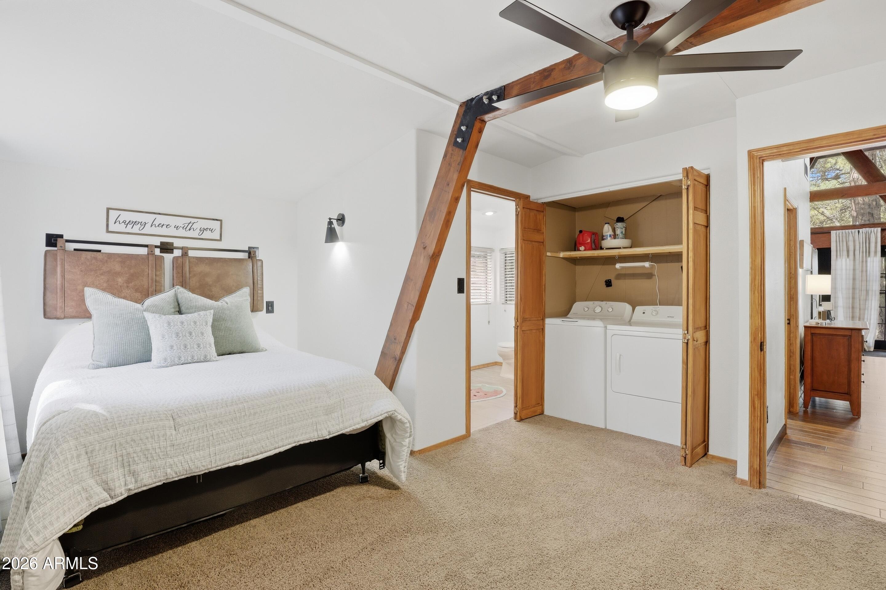 5101 Marys Way Pine, AZ 85544 - Photo 23 of 37 a bedroom with a bed and a ceiling fan