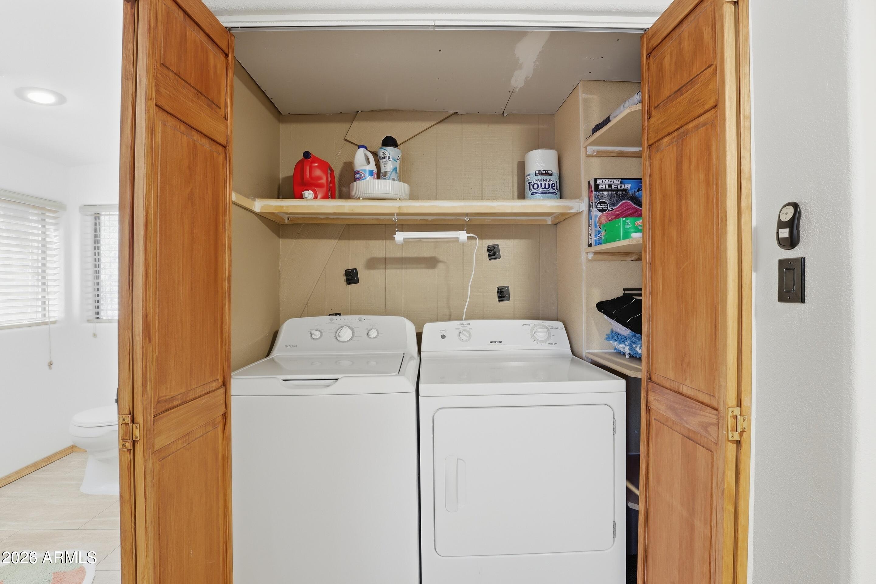 5101 Marys Way Pine, AZ 85544 - Photo 25 of 37 a utility room with dryer and washer