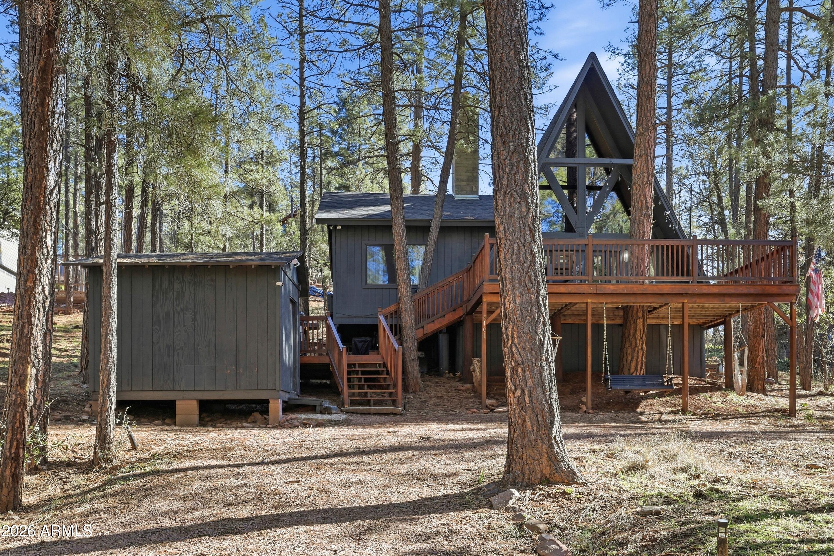 5101 Marys Way Pine, AZ 85544 - Photo 2 of 37 front view of a house with a tree