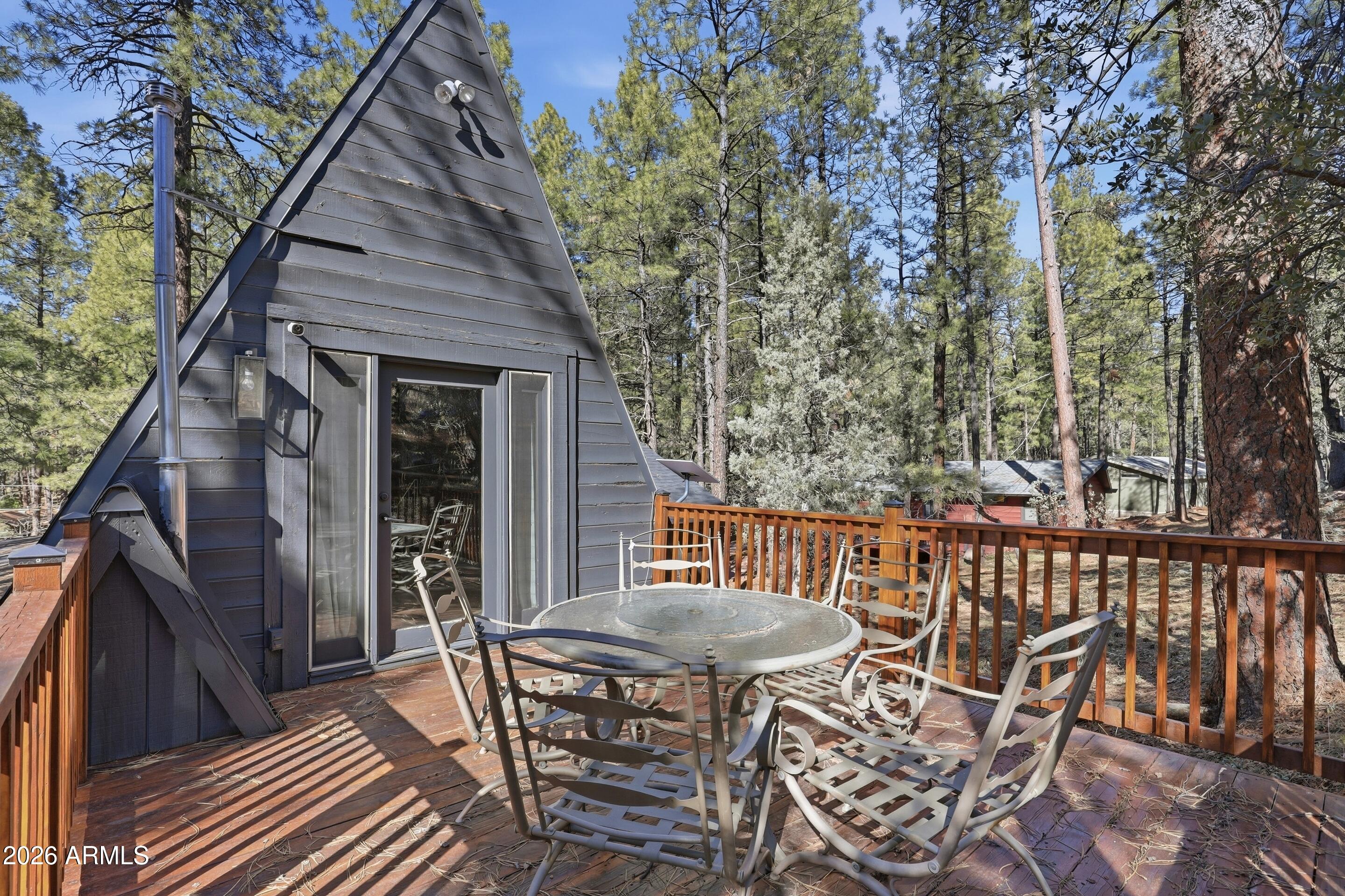 5101 Marys Way Pine, AZ 85544 - Photo 31 of 37 a view of a chairs and table in the balcony