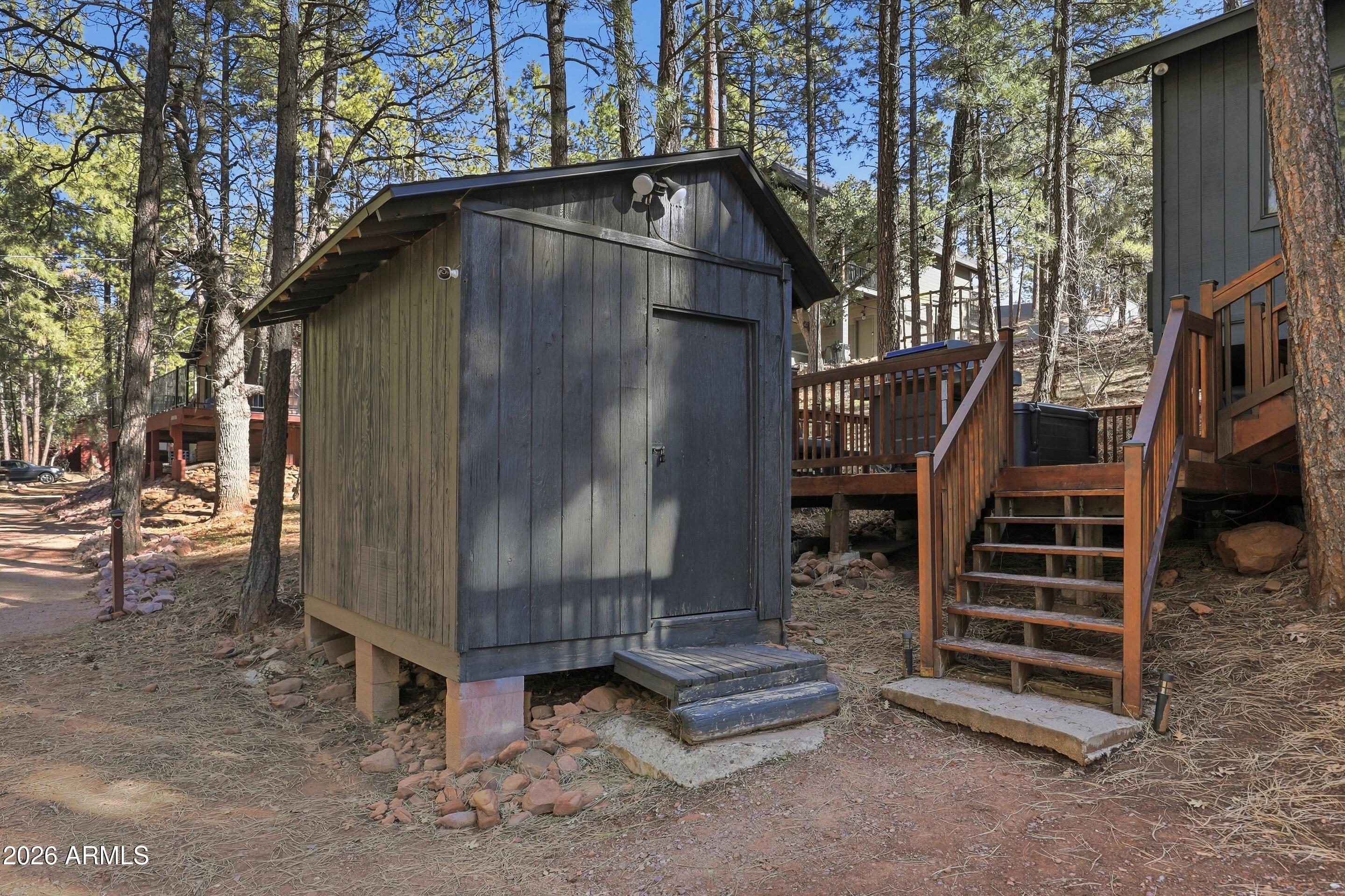 5101 Marys Way Pine, AZ 85544 - Photo 33 of 37 a wooden house with a outdoor space
