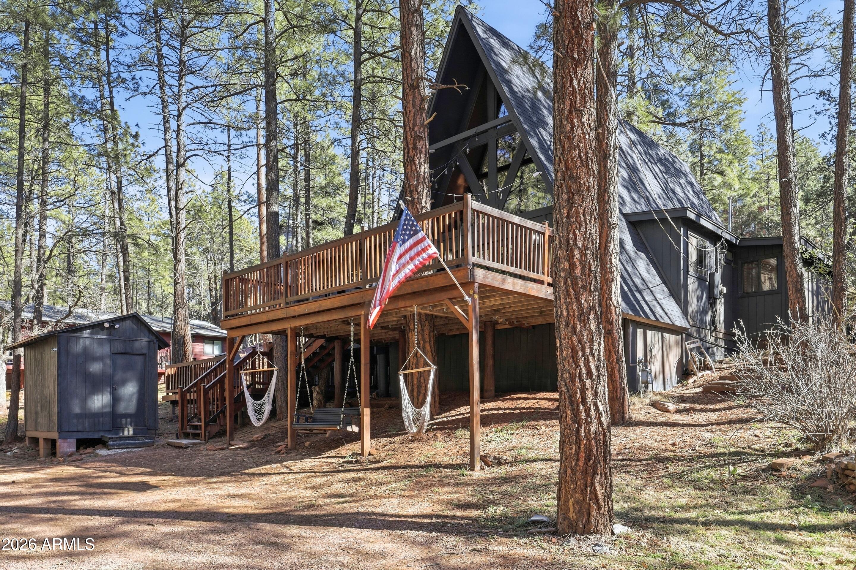5101 Marys Way Pine, AZ 85544 - Photo 35 of 37 a view of a house with a small yard