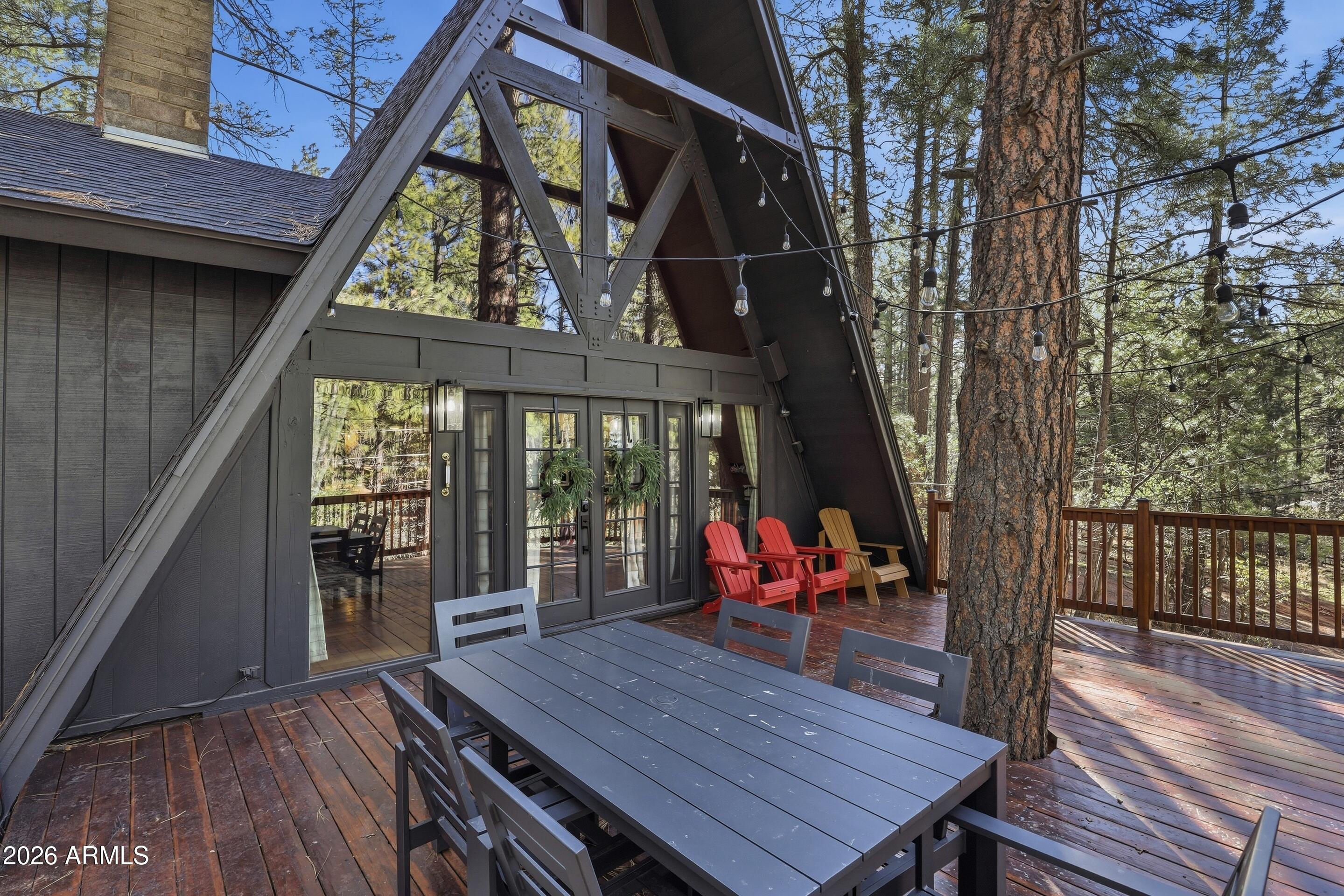 5101 Marys Way Pine, AZ 85544 - Photo 5 of 37 a view of deck with wooden floor and outdoor seating