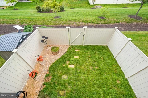 a view of a yard with an outdoor space