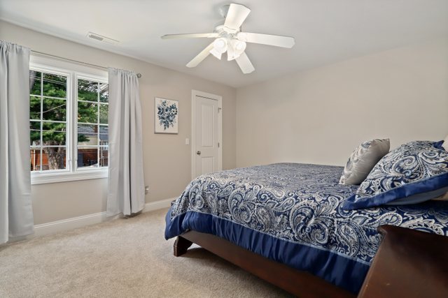 1032 South Spring Avenue La Grange, IL 60525 - Photo 22 of 44 a bedroom with a bed and a window