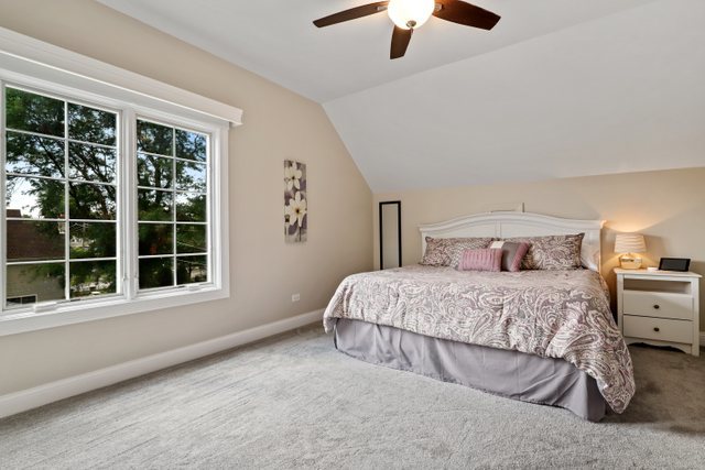 1032 South Spring Avenue La Grange, IL 60525 - Photo 31 of 44 a bedroom with a large bed and a large window