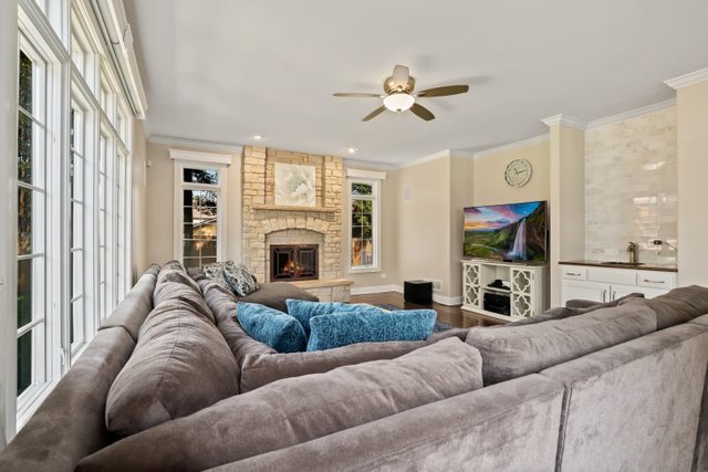1032 South Spring Avenue La Grange, IL 60525 - Photo 5 of 44 a living room with furniture and a fireplace